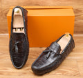 Mocassins en cuir gaufré style crocodile avec pampilles