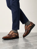 Richelieu Richelieu Brogue à bout fleuri (souvent appelé Wingtip Brogue Oxford)